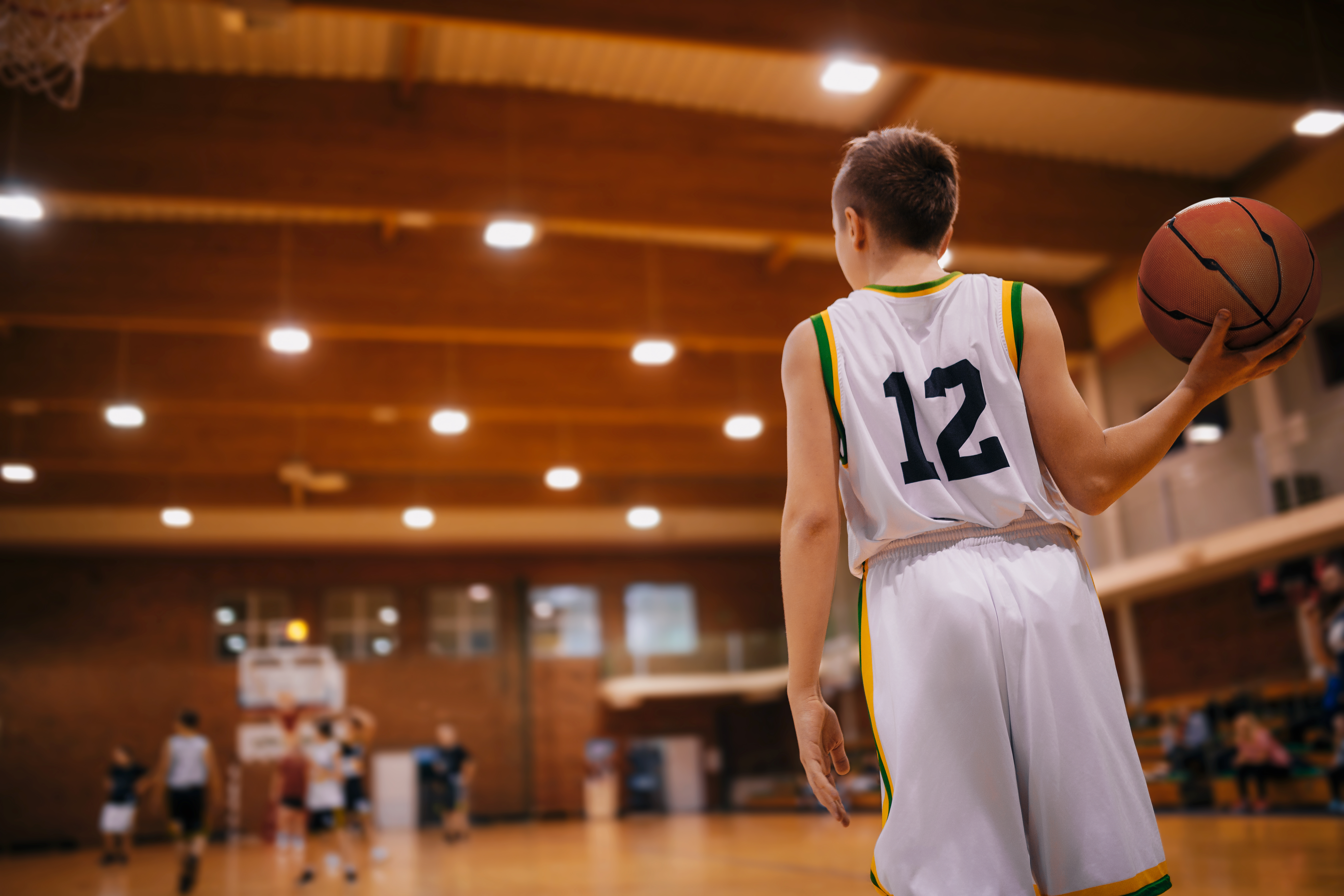 Junior Basketball Players In A Game